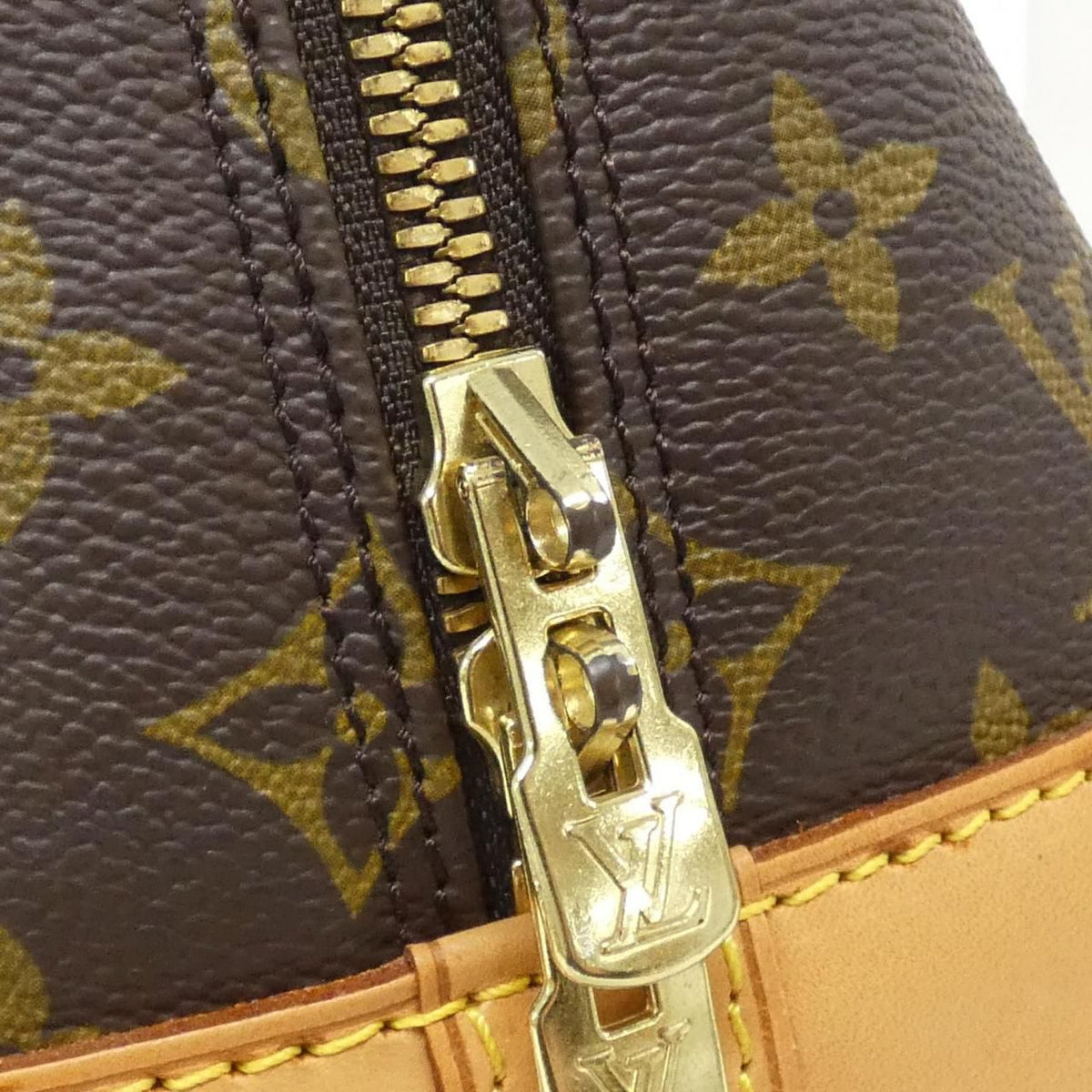 Louis Vuitton Alma Monogram Bag