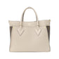 Louis Vuitton On My Side calf leather coated canvas bag