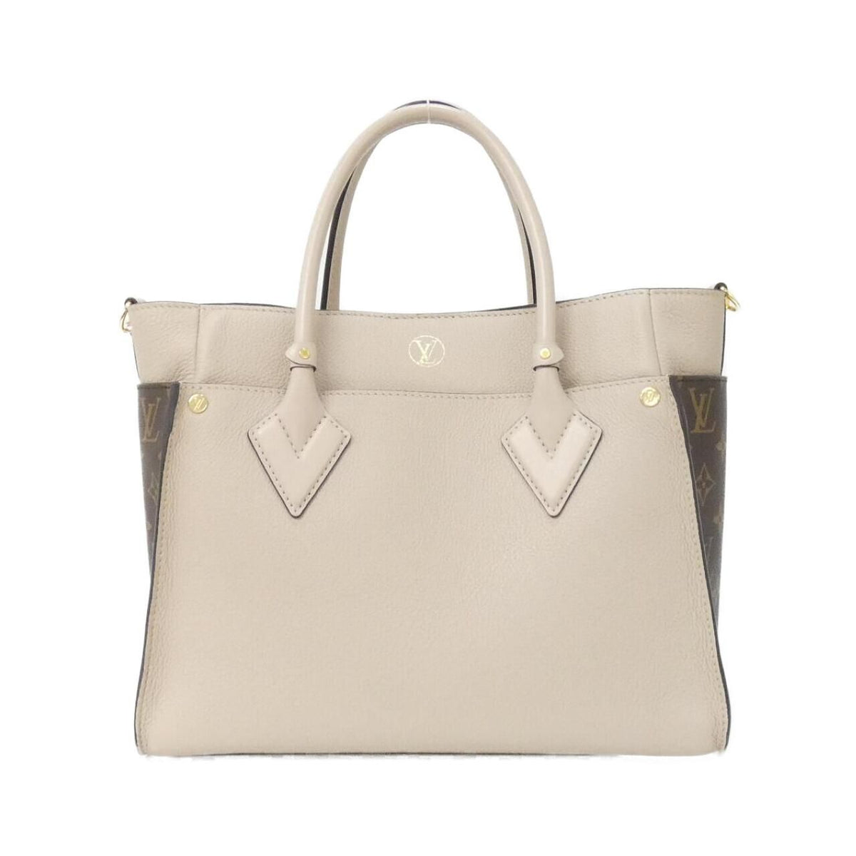 Louis Vuitton On My Side calf leather coated canvas bag