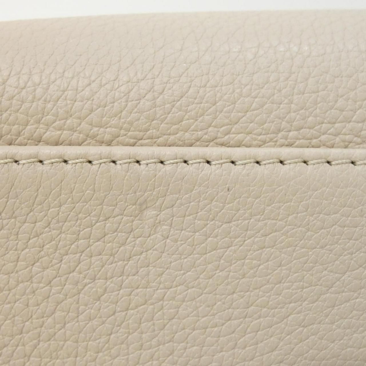 Louis Vuitton On My Side calf leather coated canvas bag