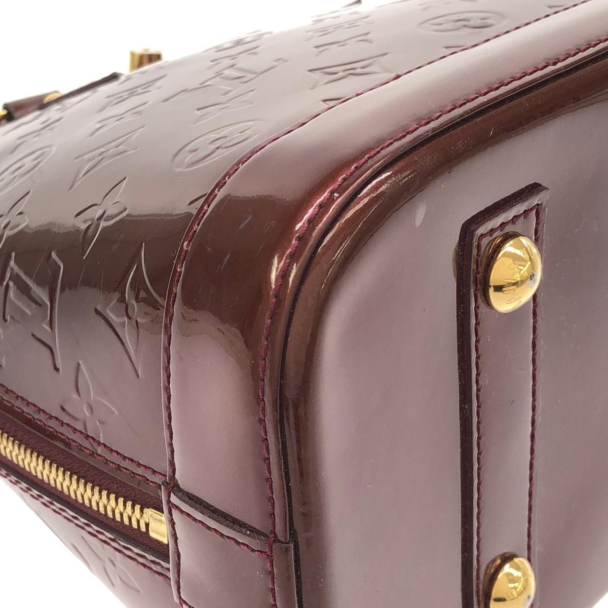 Louis Vuitton Alma Vernis Handbag