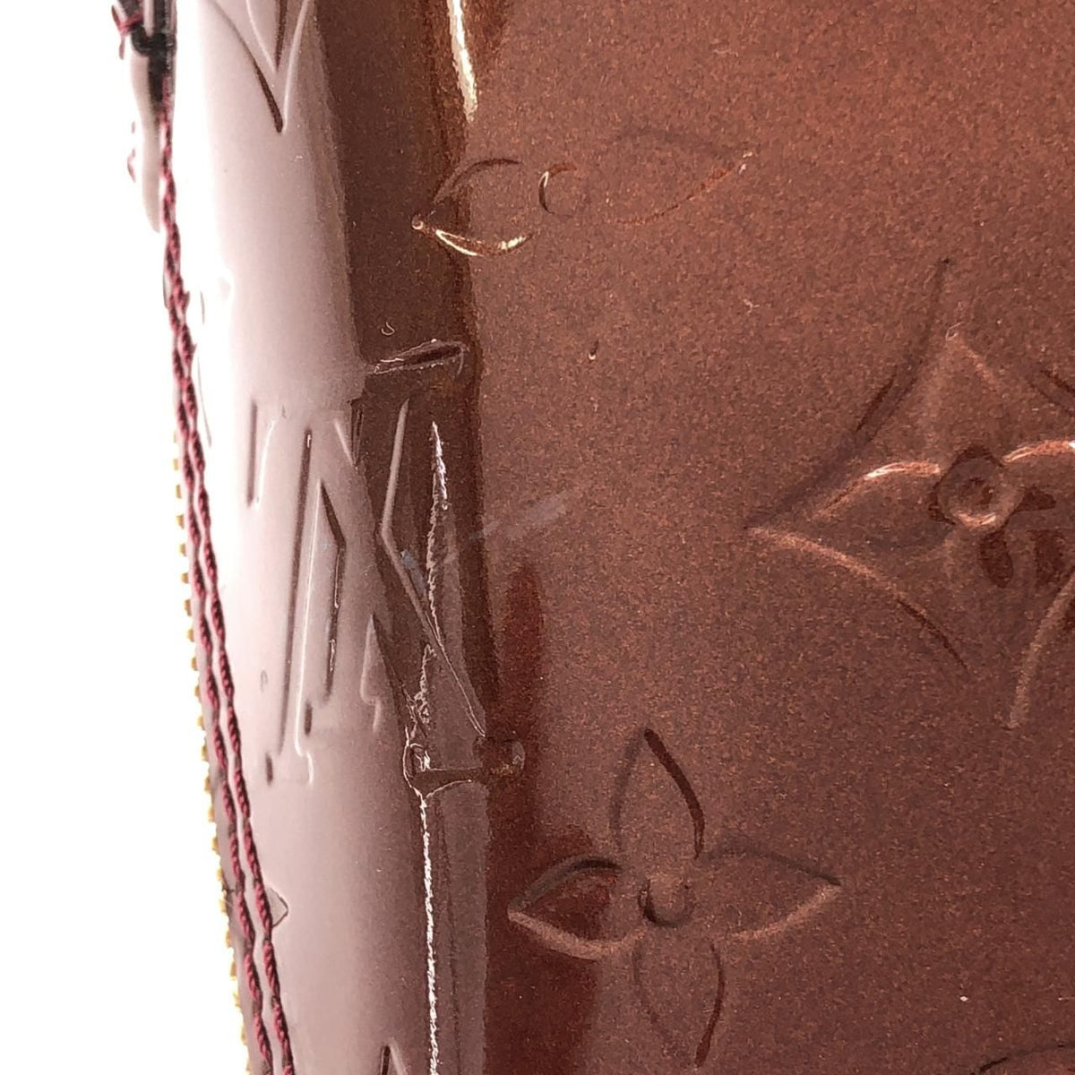 Louis Vuitton Alma Vernis Handbag
