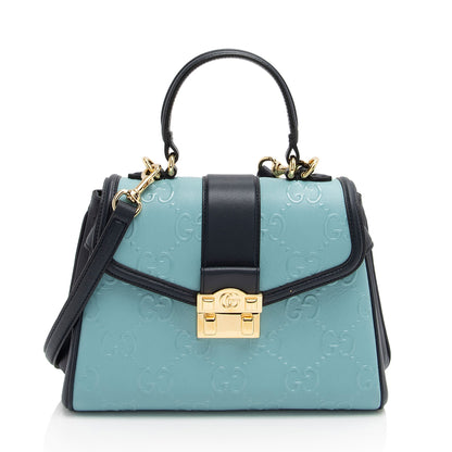 Gucci GG Debossed Leather Small Top Handle (SHF-ur1BGP)