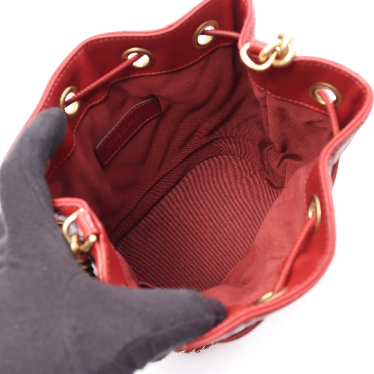 CHANEL Red Chevron V-stitch drawstring bucket bag leather 2104102523660